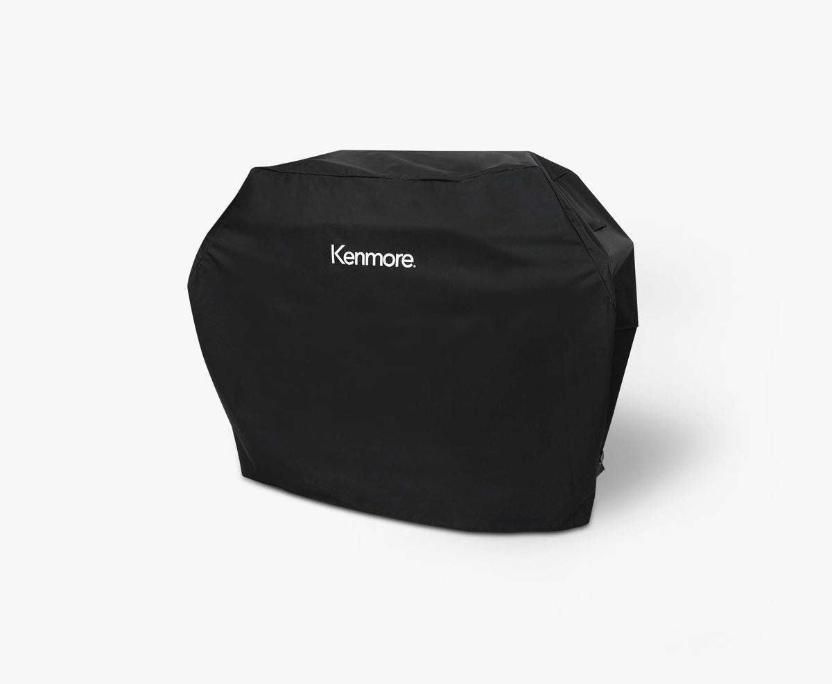 Kenmore 56-inch universal gas grill cover, black, with white Kenmore logo, front three-quarter view