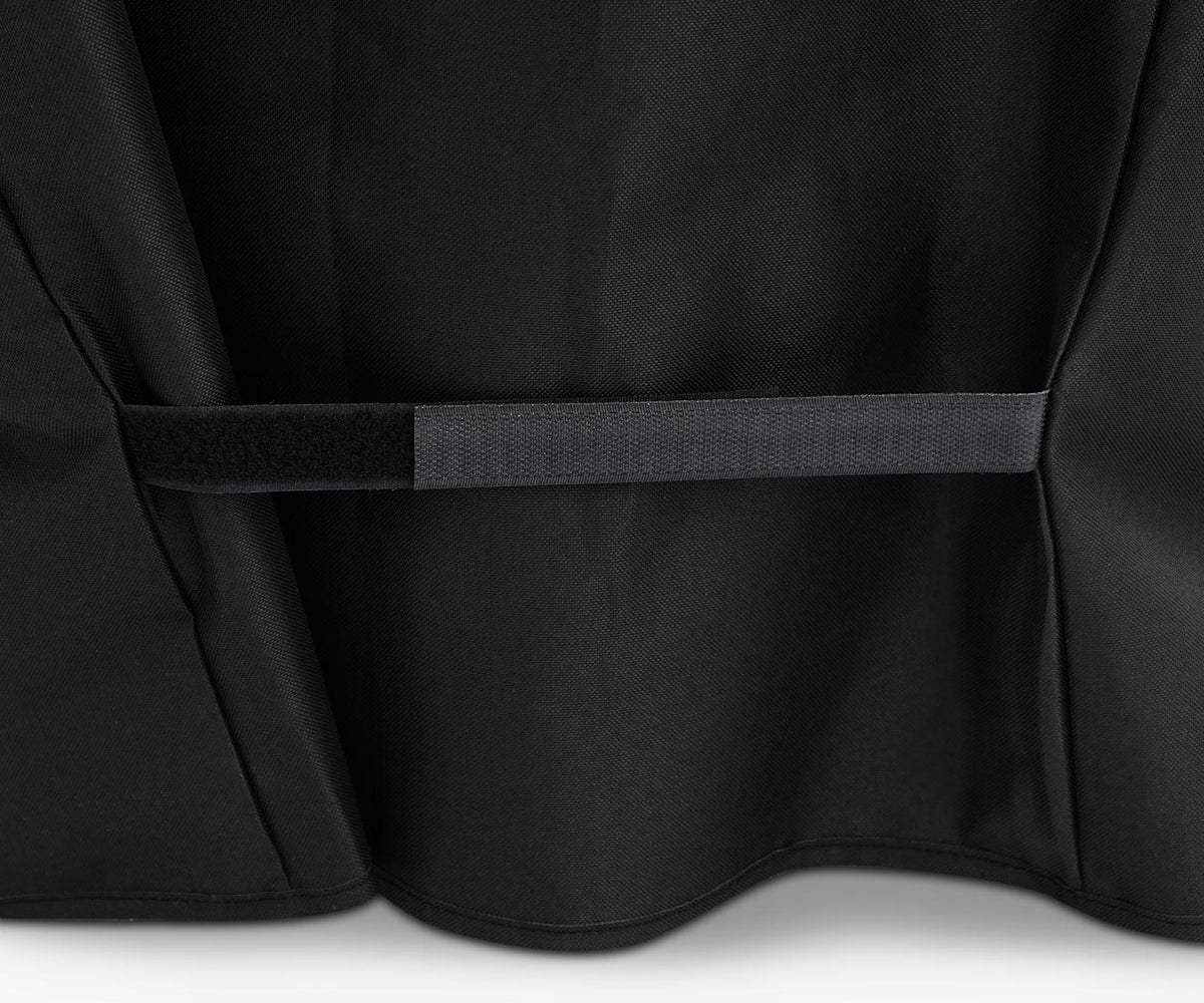 Kenmore 56-inch grill cover, black, close-up of the hook-and-loop fastening strap
