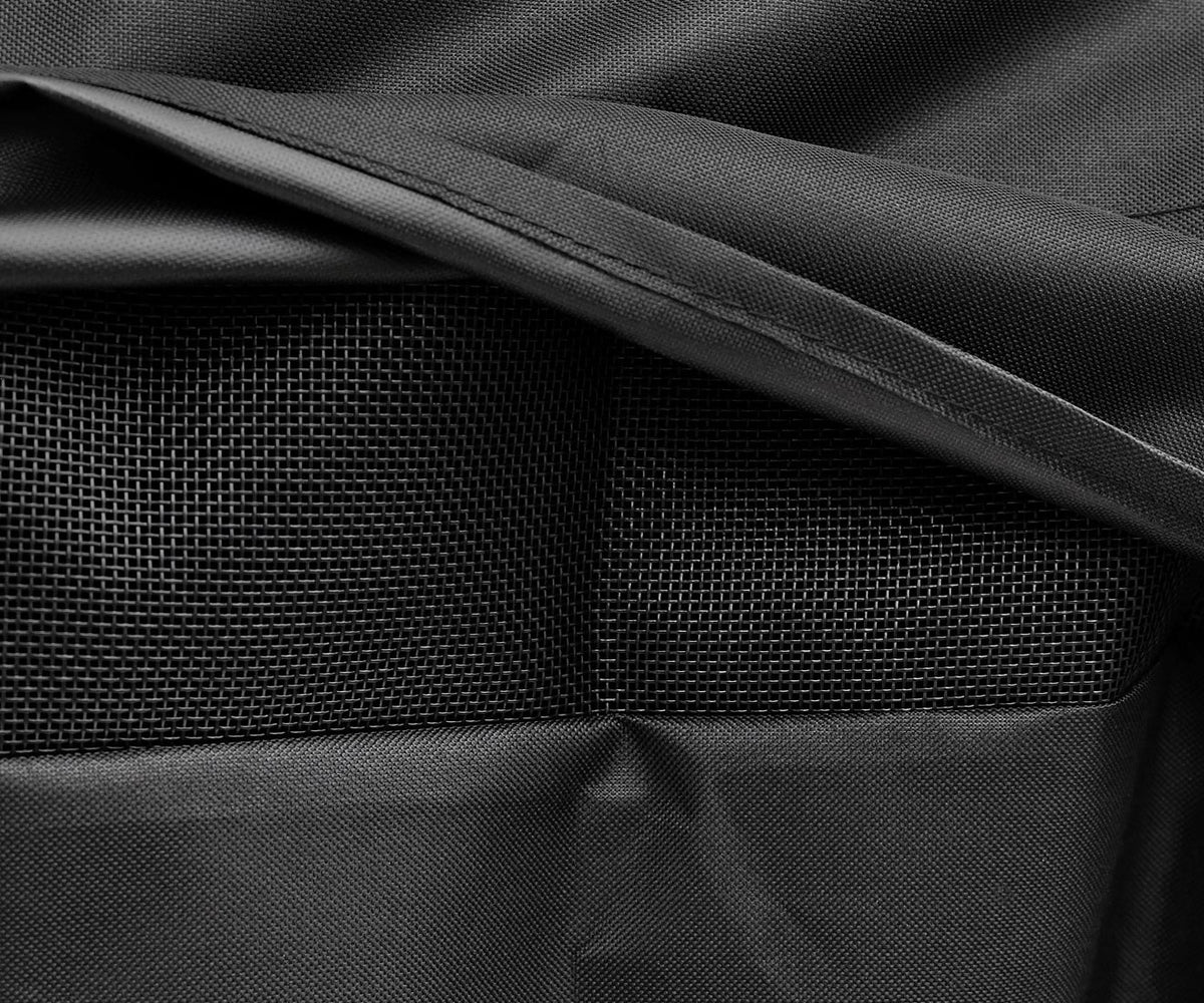 Kenmore 56-inch grill cover, black, close-up with a fabric flap lifted to show a mesh panel